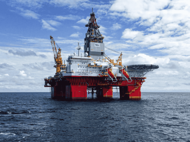 An oil rig in the middle of the ocean