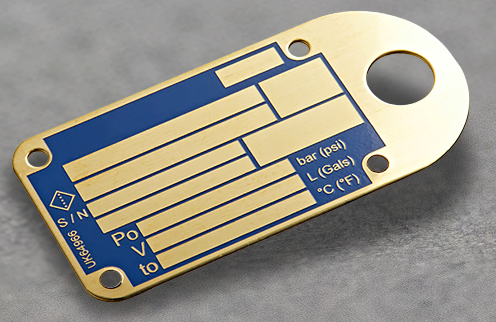 A bespoke brass nameplate with blue colourings and information fields.