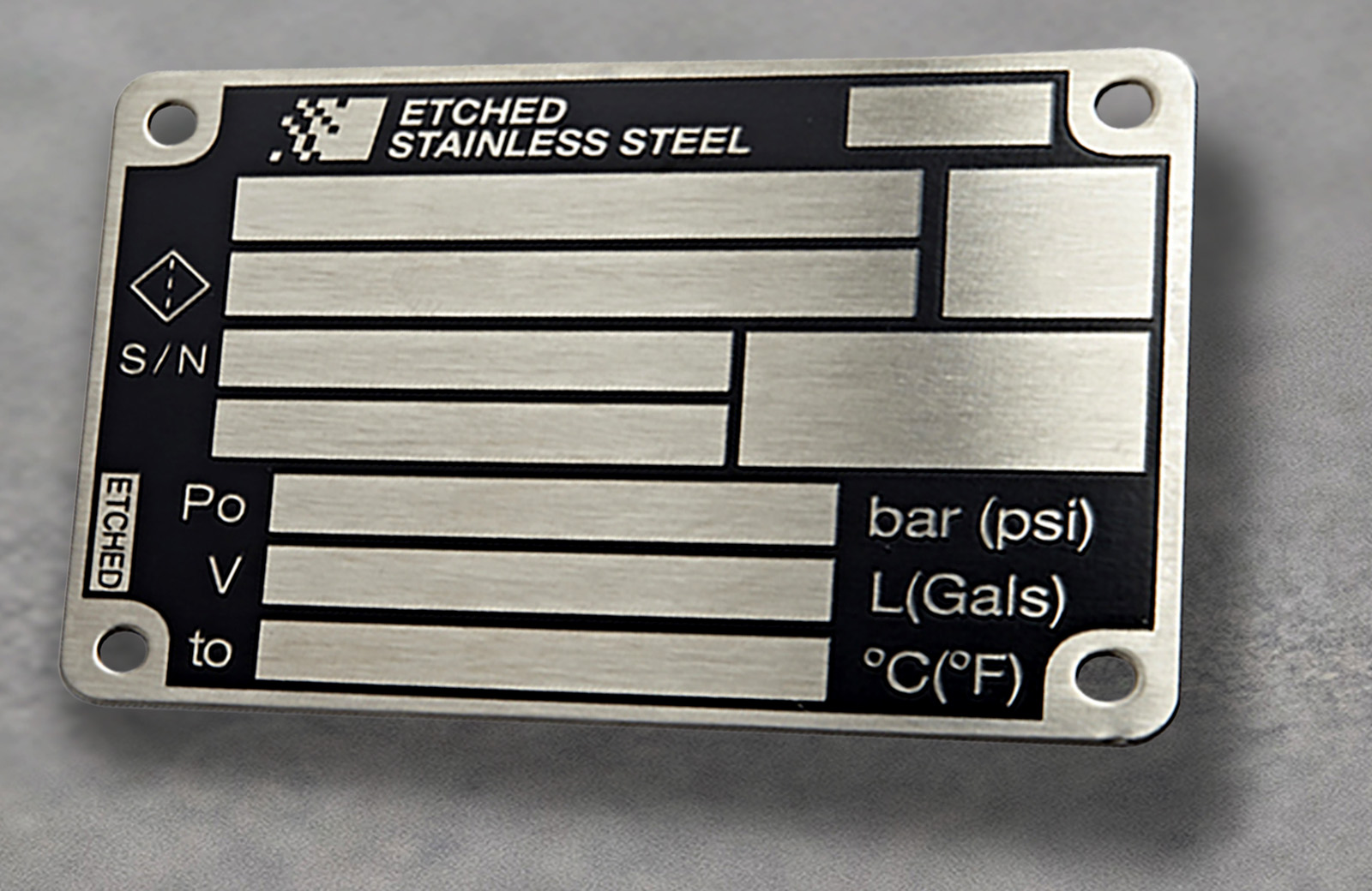 A stainless steel label with section to include equipment information.