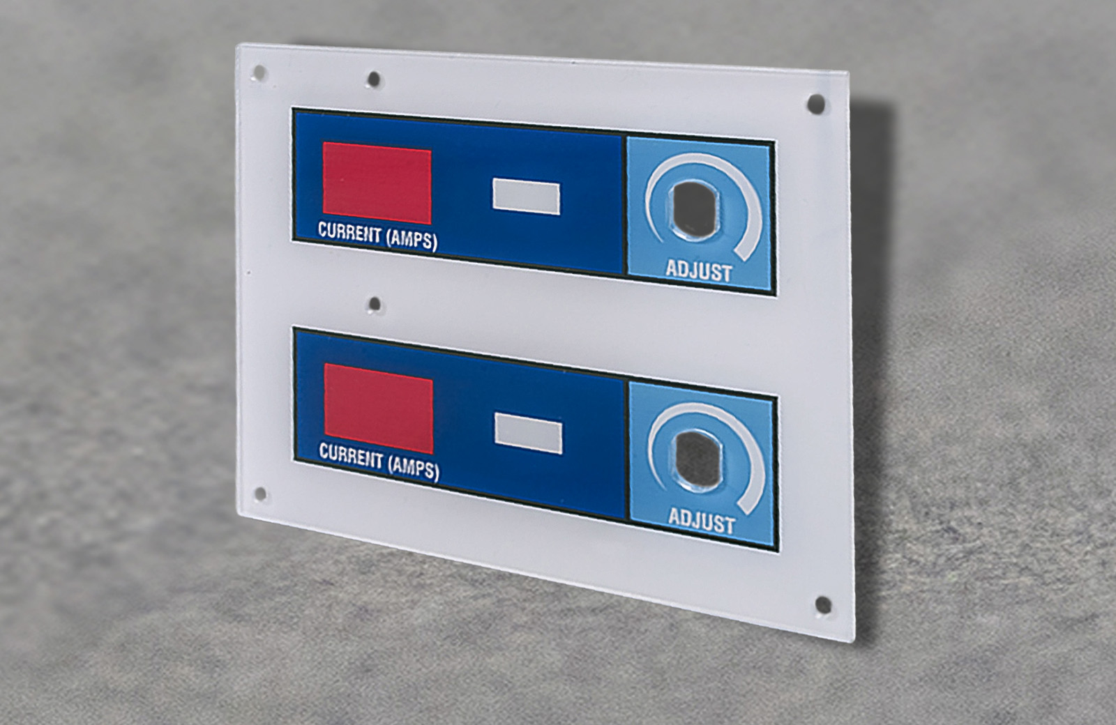 A printed fascia with slots for different buttons.